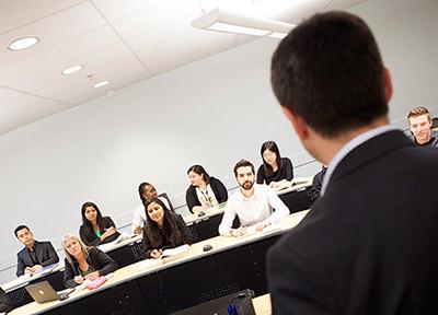 Professor and students in class
